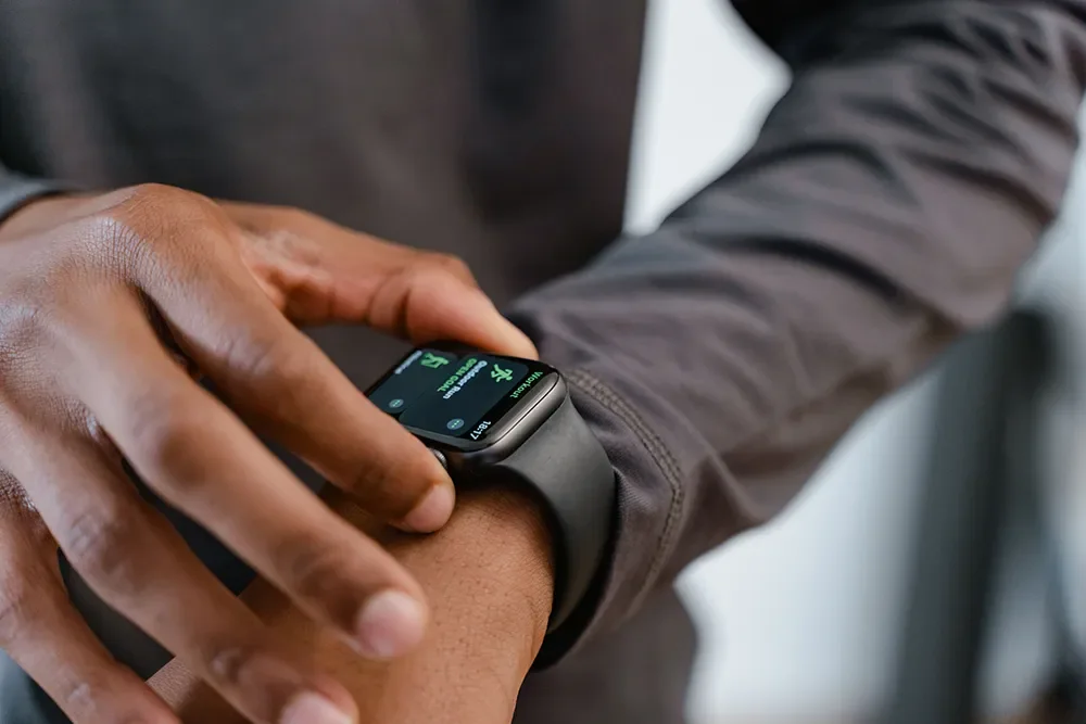 Close-up of a person checking a smartwatch